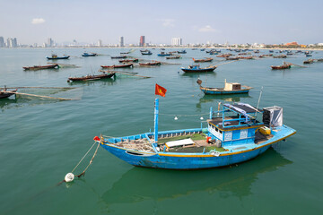 Fototapeta premium Traditional Vietnamese fishing boats in Da Nang bay on sunny day. Vietnam.