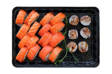 Sushi set in black box isolated on white background. Japanese sushi, philadelphia rolls. Takeaway. Top view.
