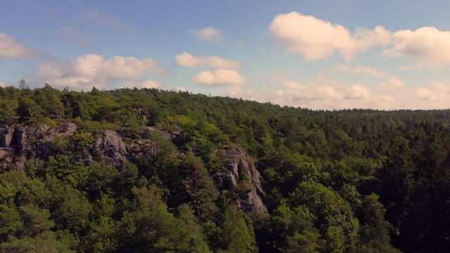 Drone of rocks formation in the woods of  molloesunds village on a sunny day in Stocken, Sweden