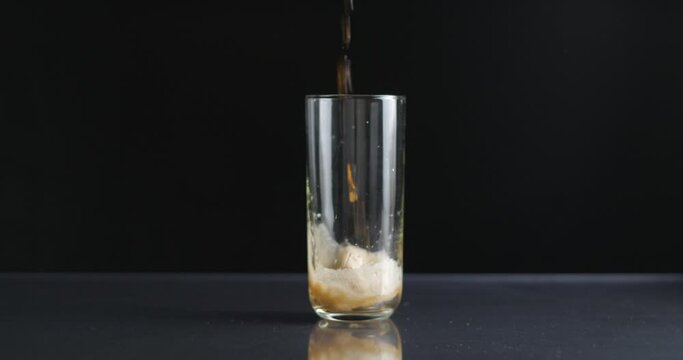 Cola soda can pouring in glass slow-motion, 4k prores