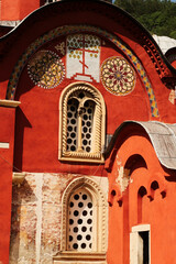 Obraz premium Elaborate details around the windows on the facade of the Church Complex of the Patriarchate of Pec Monastery, outside of Peja, Kosovo