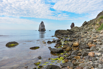 rocky shore of Black Sea, landscape with rocks on seashore, rocks sticking out of sea