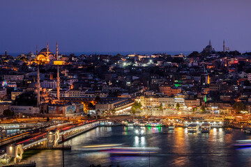 Fototapeta premium Beautiful view of gorgeous historical Suleymaniye Mosque, Rustem Pasa Mosque and buildings in a cloudy day. Istanbul most popular tourism destination of Turkey 