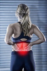 Fototapeta na wymiar Woman, fitness and back injury with red glow for pain, accident or bruise after workout or exercise at gym. Rear view of female person with sore spine, ache or inflammation for hurt joint or muscle