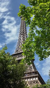 The Eiffel Tower in Paris, France, seen from various angles and perspectives, illustrating France, vacations, cities, tourism, Europe, and the Olympic Games