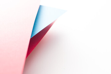 Close up of abstract red, white and blue 3d background, colored paper