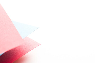 Red, blue and white geometric 3d colored paper background