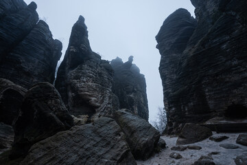 Gloomy and totally moody path lost in the foggy rocks with the best dark and mystic atmosphere in...