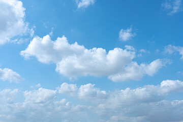 Obraz premium Beautiful Blue Sky with Fluffy White Clouds