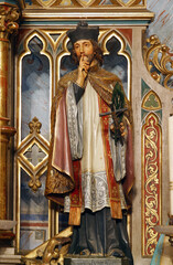 Obraz premium Saint John the Nepomuk statue on the altar Immaculate Heart of Mary in the Parish Church of Saint Joseph in Grubisno Polje, Croatia