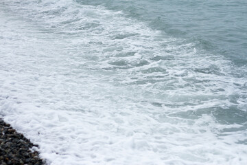 Fototapeta premium Sea wave crashing on the shore