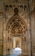 ornamental arch and doorway leading into the cloister of the Segovia Cathedral