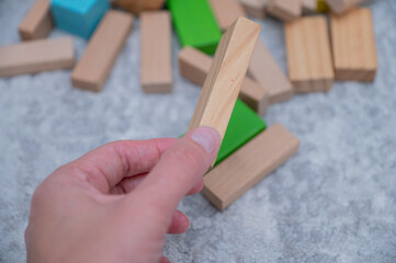Children wooden blocks parts for game.Board game concept .Entertaining games for children.Kindergarden education games.close up view