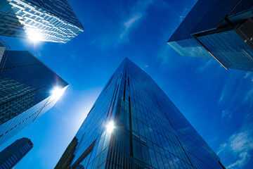 A cloud reflecting a building in the business town wide shot