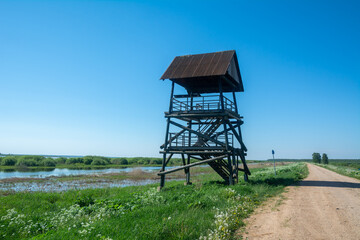 Bird watching tower in lake Lubanas.