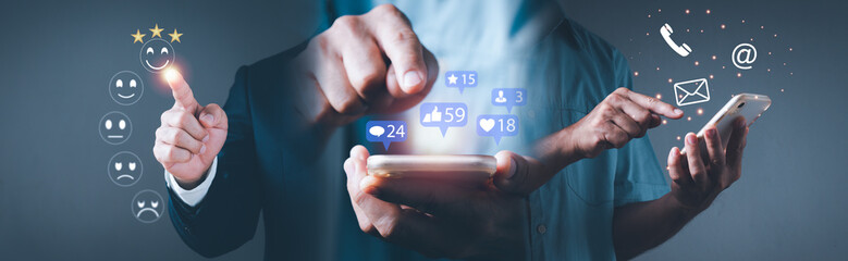 A man writes on his smartphone to send texts and use emojis to interact with others. idea over a smartphone screen with notification symbols for likes, messages, emails, comments, and stars