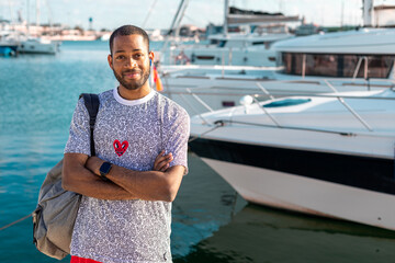 Young Entrepreneur Standing in Front of His New Boat: Business Concept