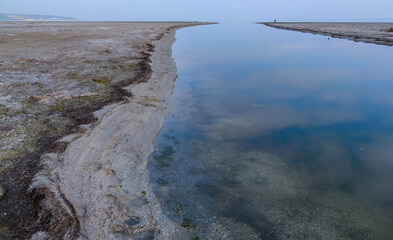 Artificial canal in the lower reaches of the Tiligul estuary, connecting the estuary with the sea, Ukraine