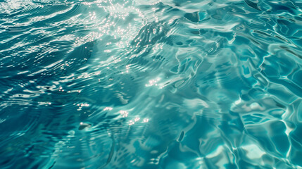 Obraz premium Rippling blue water texture with light reflections.