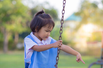 Asian little girls playing on playground