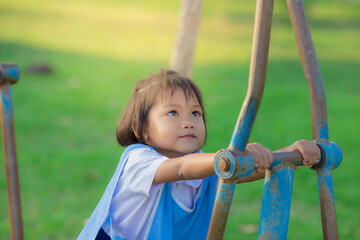 Asian little girls playing on playground