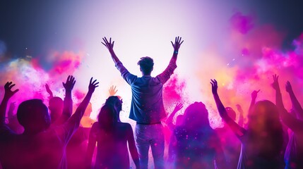 Energetic crowd with vibrant colors and raised hands at a festival or concert. Celebratory atmosphere with bright lighting and colorful smoke.