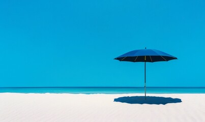 blue beach umbrella on empty white sand shore