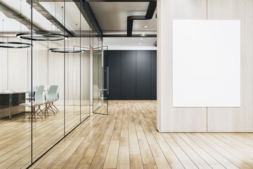 A modern office interior with glass partitions, wood floor, and an empty poster mockup on the wall, depicting a concept of design. 3D Rendering