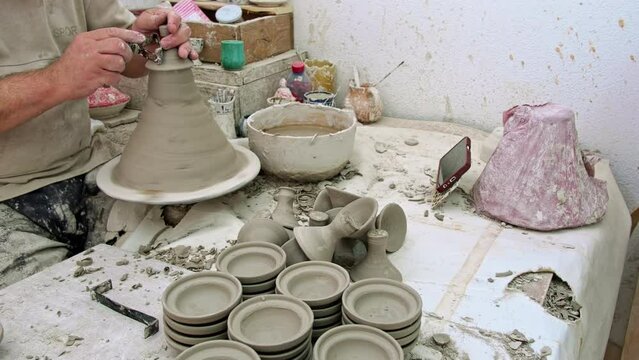 Fes, Morocco Production of ceramic and mosaic, laboratory with craftsman workers manufacturing in Fez, the imperial city of Morocco.