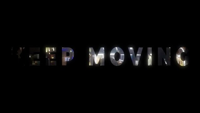 animated text effect of keep moving word with city night timelapse as black background masking