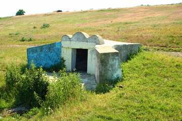 A stone structure in a field