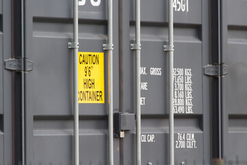 Gray shipping container close-up.