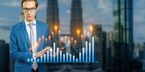 Businessman with digital graphs overlaid, city background, indicating growth
