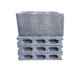 A stack of gray blocks with holes in them