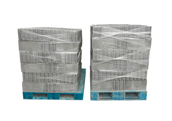 A stack of metal boxes wrapped in plastic