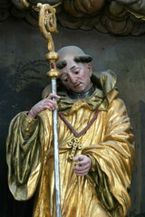 Obraz premium Saint Leonard of Noblac statue on main altar in the church Leonard of Noblac in Kotari, Croatia