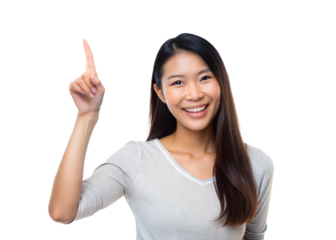 A woman with long hair smiles and points upwards with one finger, standing against a plain white background