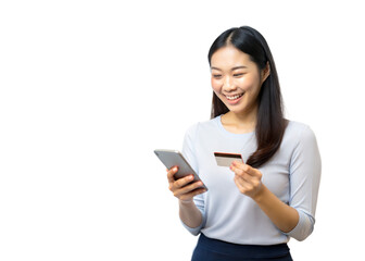Fototapeta premium A smiling woman uses a smartphone while holding a credit card, making an online purchase
