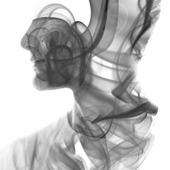 A black and white double exposure profile portrait silhouette of a man