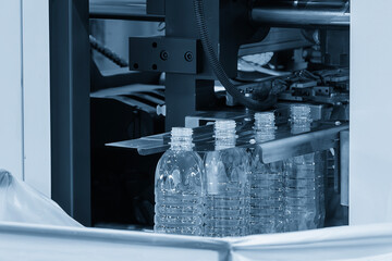 The drinking water bottle manufacturing process by blow mold machine.