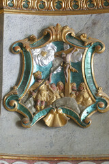 Calvary, Jesus on the Cross, detail at a pulpit in Church of the Three Kings in Komin, Croatia
