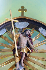 The Risen Christ statue on the main altar in All Saints Parish Church in Bedenica, Croatia