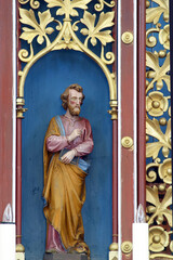 Obraz premium Saint Mark the Evangelist, statue on the main altar in the parish church of Our Lady of Miracles in Ostarije, Croatia