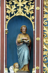 Obraz premium Saint Matthew the Evangelist, statue on the main altar in the parish church of Our Lady of Miracles in Ostarije, Croatia