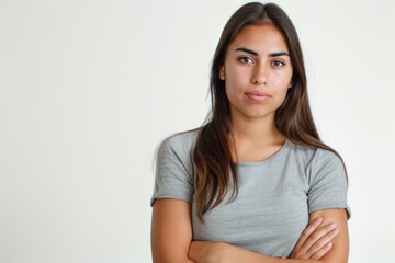 Fototapeta premium Young challenging Latina woman isolated vertical photo white background