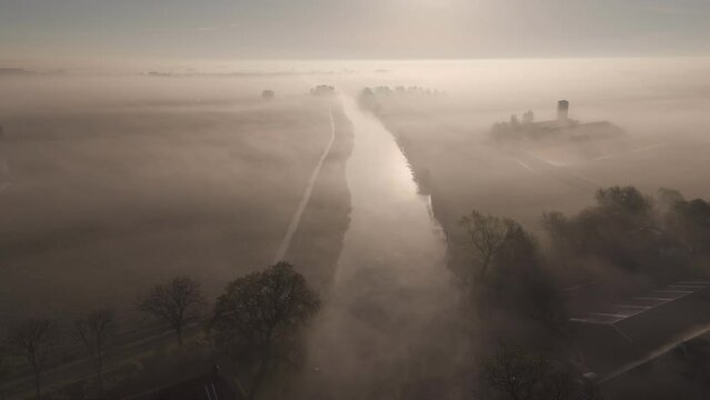 Morning Mist over Dokkumer Ee River, Friesland: Aerial View