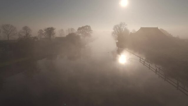 Morning Mist over Dokkumer Ee River, Friesland: Aerial View