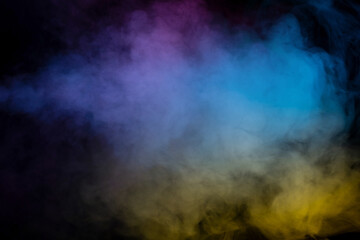 Blue and purple steam on a black background.