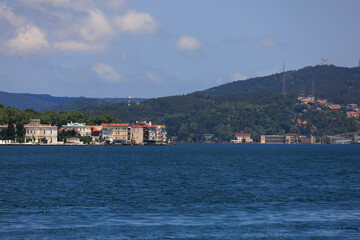 Turquoise blue sea water. View of the Bosphorus in Istanbul city on sunny summer day, in a public place.