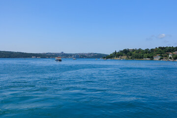 Turquoise blue sea water. View of the Bosphorus in Istanbul city on sunny summer day, in a public place.